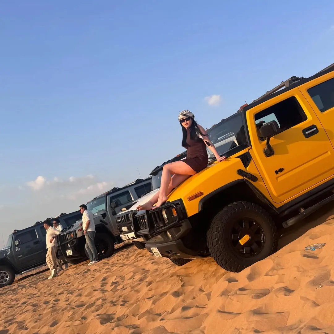Guests enjoying a luxury Hummer desert safari ride in Dubai